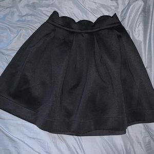 Francesca’s black skirt